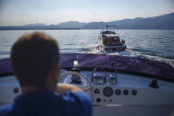 From Peschiera: Cruise on the southern coast to Sirmione - The Swim Stop From the Boat: Simple, Refreshing, and a Little Adrenaline