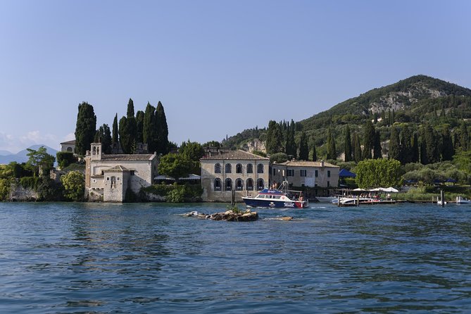 From Peschiera: Cruise on the southern coast to Sirmione - Captain Gigi and the Laid-Back Host Energy