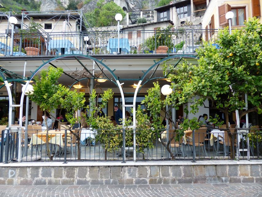 Full-Day Lake Garda Tour: Bus & Public Boat with Guide - Choosing Your Day: Monday Salò to Sirmione vs Friday Sirmione to Malcesine