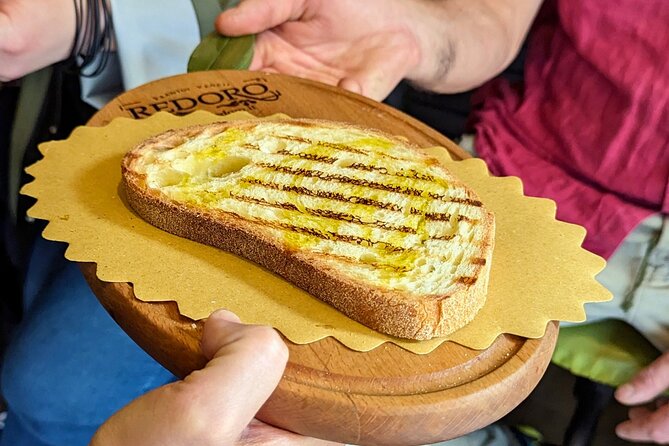 Guided Food Tour with Wine Tasting in Verona - Stop 1: Castelvecchio area deli tastings (ham, cheese, and Sicily patè)