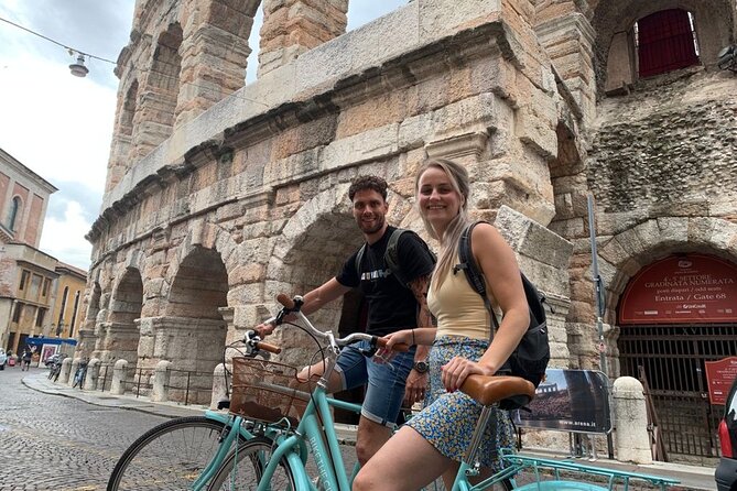 Highlights and hidden gems Verona Bike Tour - Stop 2: Porta Borsari to Piazza delle Erbe, the Roman-to-market shift
