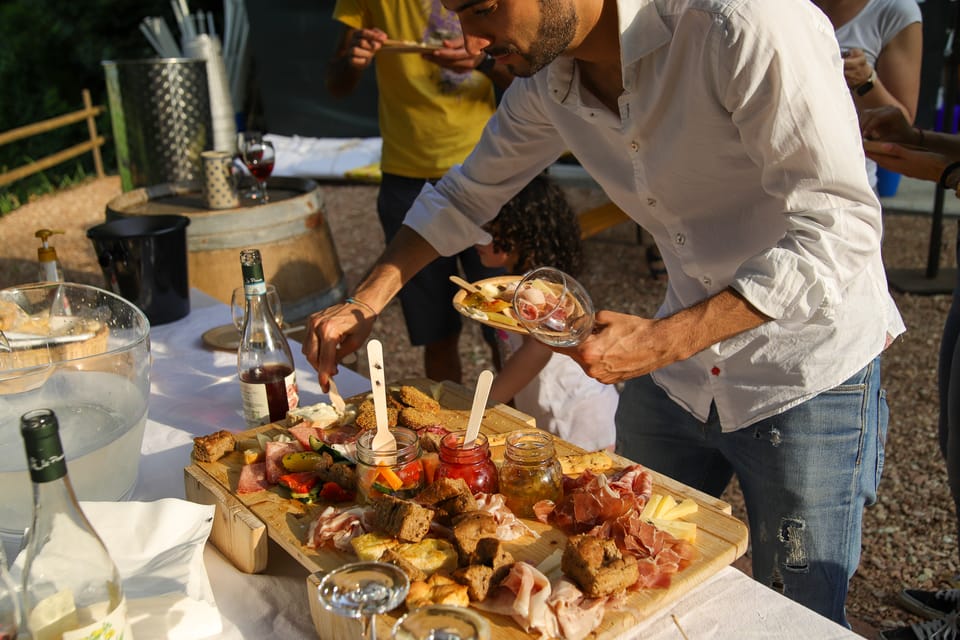 Lazise: Biodynamic Farm Tour and Natural Wine Tasting - The tasting on the terrace: natural wines with Veronese meats and cheeses