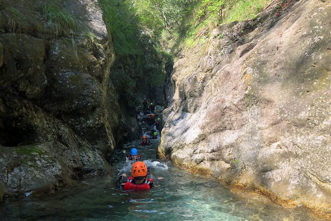 Palvico Canyoning - What happens inside the canyon: slides, jumps, cave passage, then the big drop