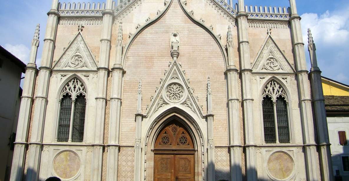 Trento private tour: medieval atmosphere of lovely old town - Church of St. Peter and Paul: Gothic Facade, Green Bell Tower, and the Chapel of Simon